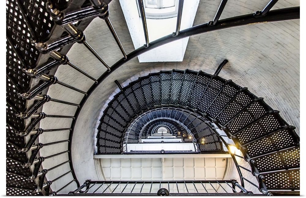 Spiral staircase in the center of a lighthouse.