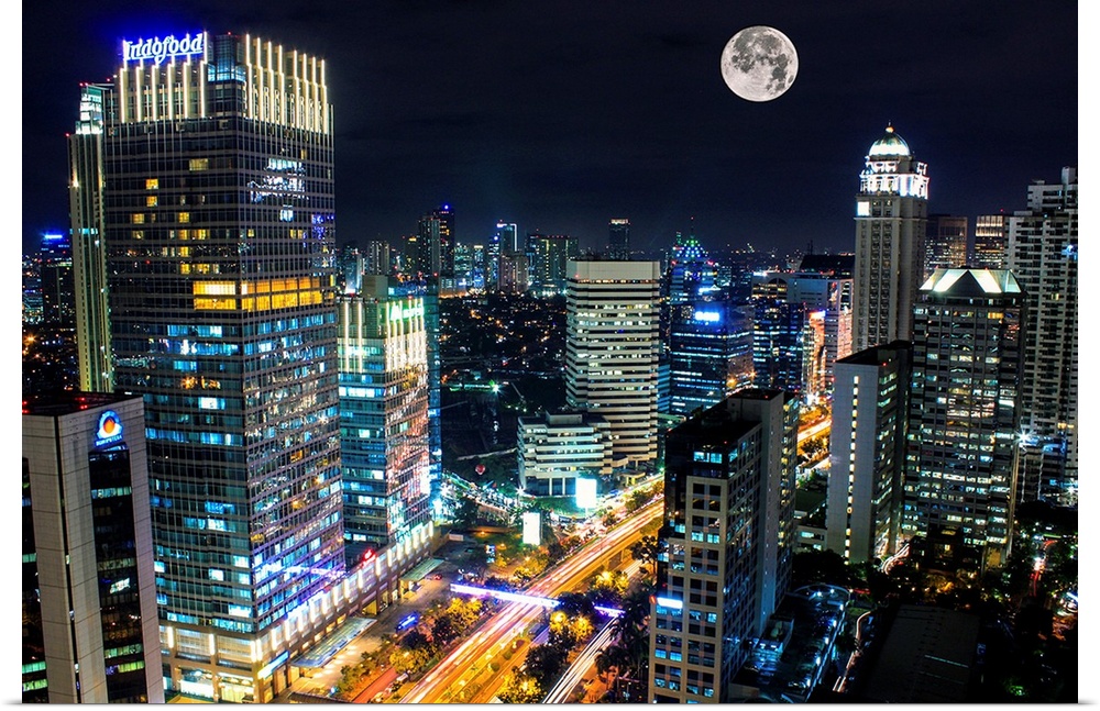 Moon over the city of Jakarta, Indonesia, at night.