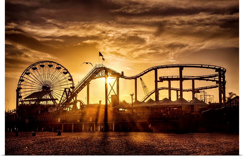 Silhouettes of the amusement park rides in Malibu, California.