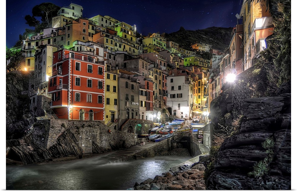 Riomaggiore at the edge of the ocean, in the evening, Italy.