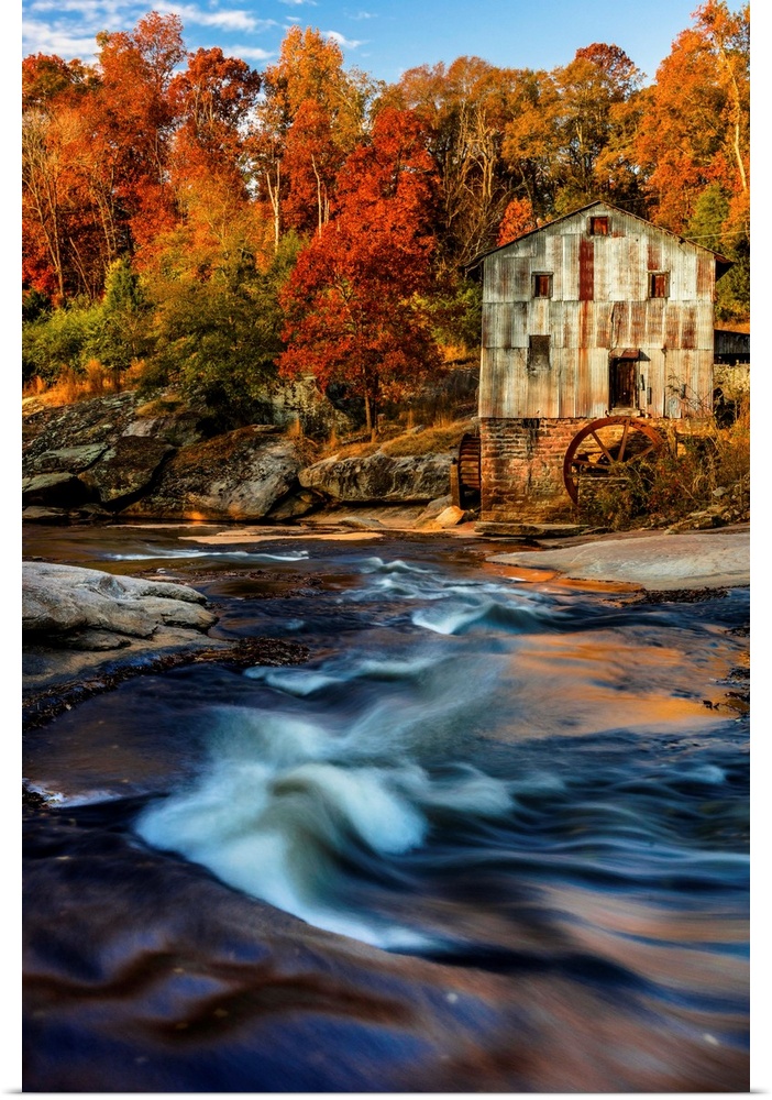 Old weathered grist mill near Spartanburg, South Carolina, in the fall.