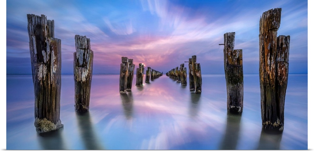 Old wooden posts in the ocean, Clifton Springs in Victoria, Australia.