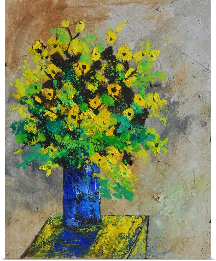 A large bouquet of flowers in bright colors of green and yellow in a blue vase, against of neutral backdrop.