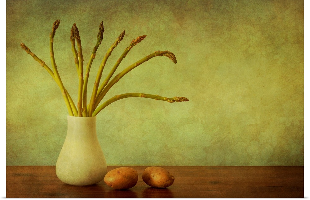 Still life with green asparagus and potatoes