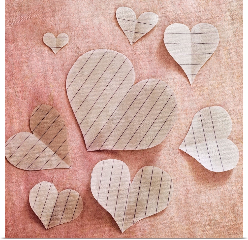Hearts, cut out of paper, arranged as a still life