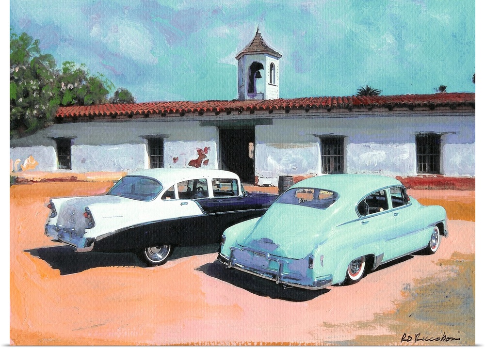 Classic Automobiles in Old Town San Diego State Historic Park. The historic adobe hacienda La Casa de Estudillo in this st...