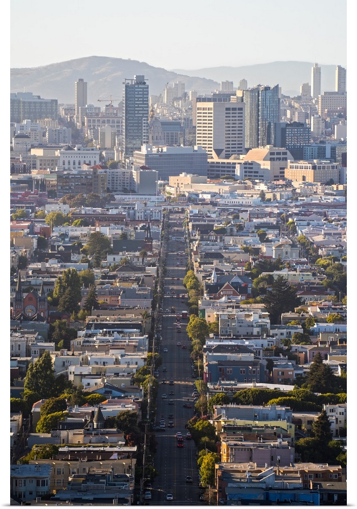 Aerial photograph of a street in downtown San Francisco leading straight into the tall buildings.