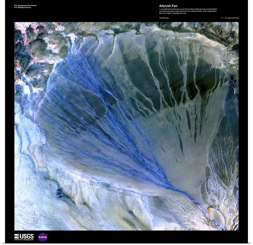 A vast alluvial fan blossoms across the desolate landscape between the Kunlun and Altun mountain ranges that form the sout...