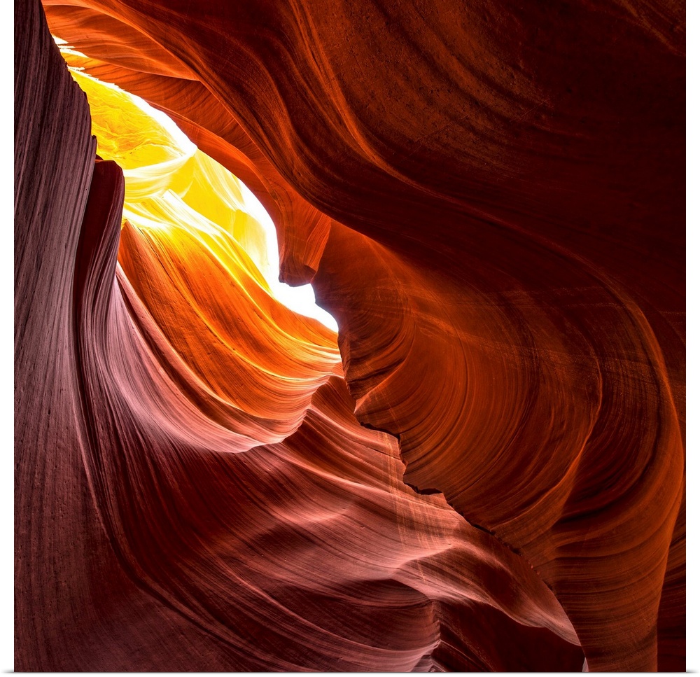 Square photograph from inside of Antelope Canyon rock formation located on the Navajo Reservation in Page, Arizona with fl...
