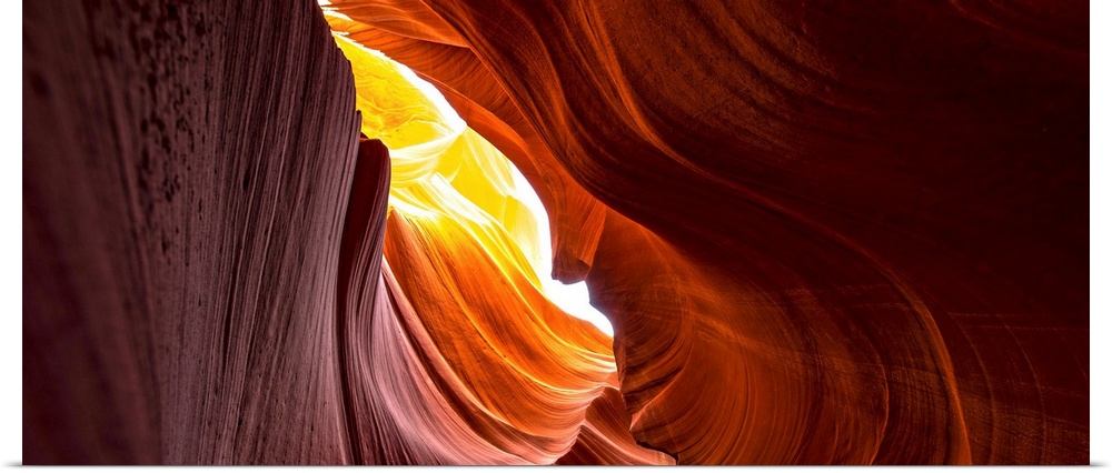 Photograph from inside of Antelope Canyon rock formation located on the Navajo Reservation in Page, Arizona with flowing s...