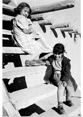 At San Ildefonso Pueblo, New Mexico, 1942, Two Young Girls Sitting On Steps