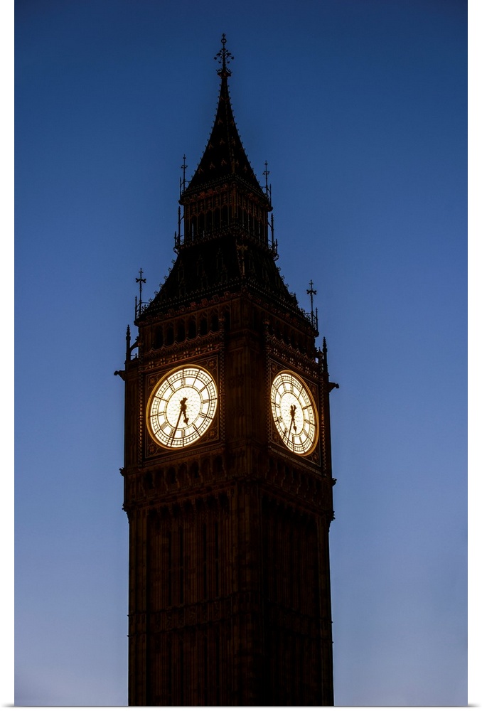 View of a famous clock tower called Big Ben in London, England at night.