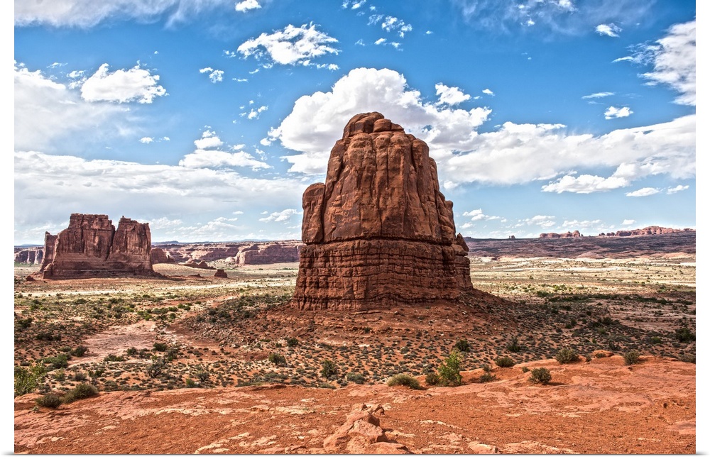 Sandstone formations, the Courthouse Towers, in the desert landscape of Arches National Park, Utah.