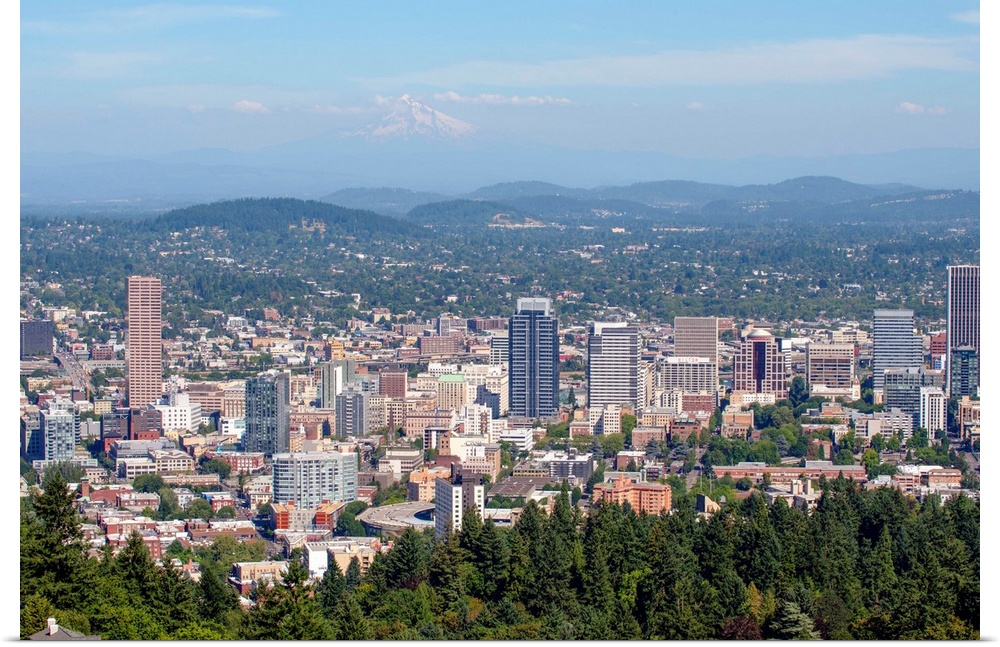 View of downtown Portland city skyline with hazy view of Mount Hood in Oregon.