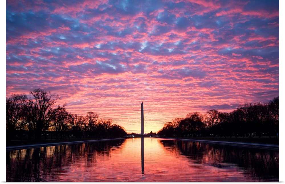 Vibrant clouds at sunset over the Washington Monument on the National Mall in Washington, DC.