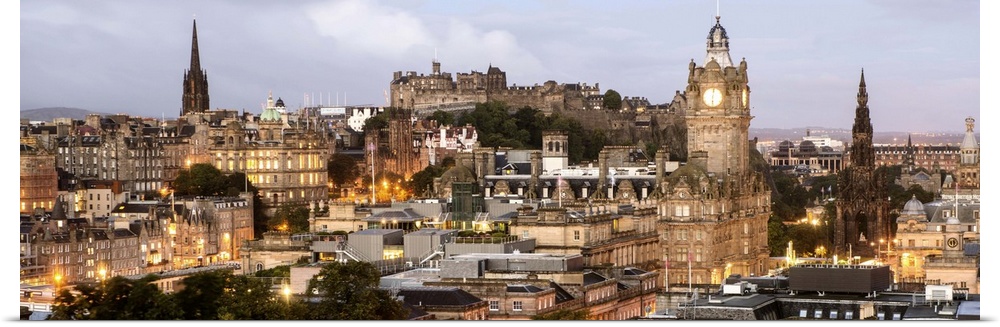 Photograph of the view of Edinburgh city centre from Calton Hill in Edinburgh, Scotland, UK at sunset.
