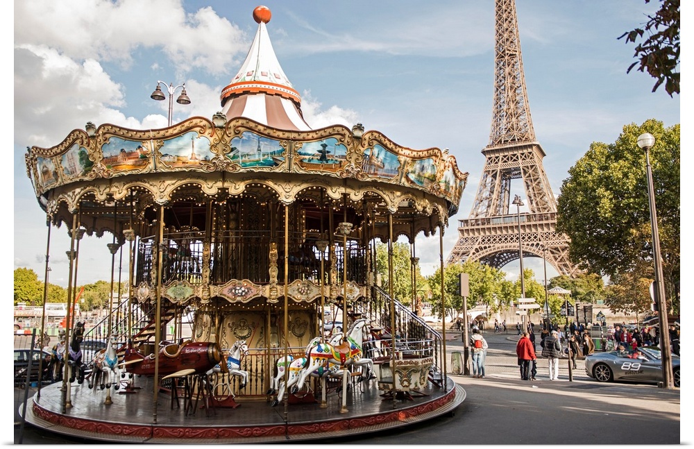 Photograph of the Eiffel Tower Carousel with the Eiffel Tower in the background.