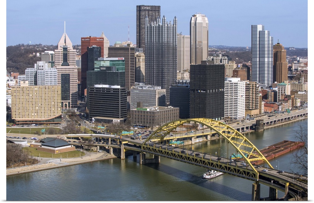 Aerial view of Pittsburgh, Pennsylvania, with the Fort Pitt Bridge leading into the city.