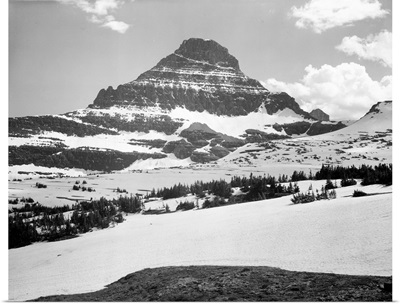 From Logan Pass, Glacier National Park, Looking Across Barren Land To Mountains