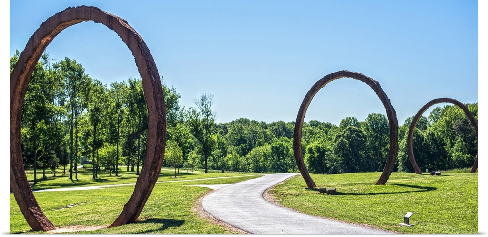 Gyre, made of three concrete and steel rings by Thomas Sayre, is a sculpture in the Ann and Jim Goodnight Museum Park at t...