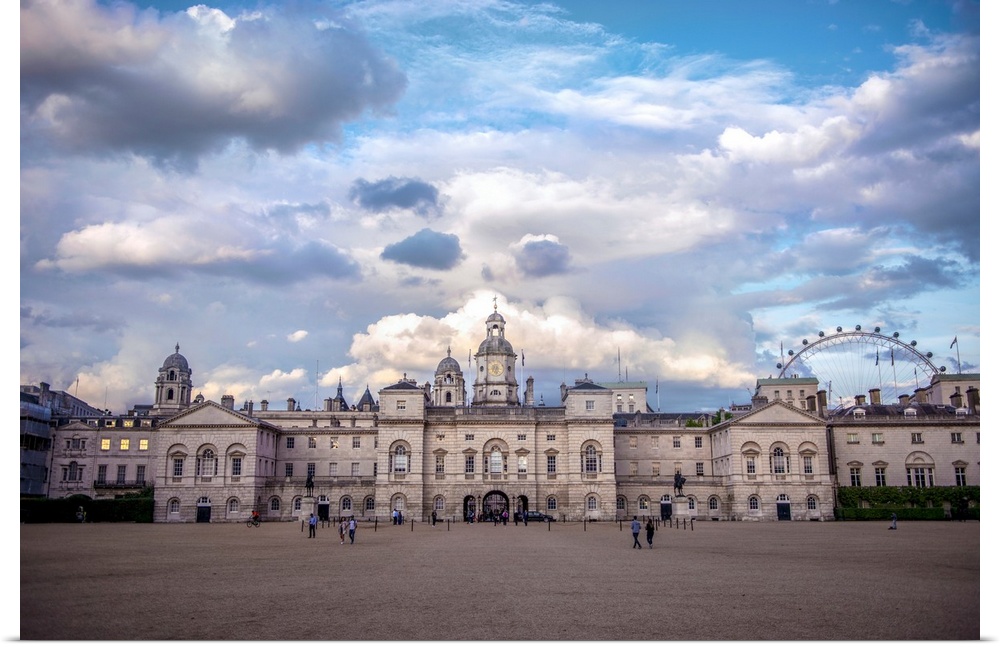 View of Horse Guards building in London, England against a bright blue sky.