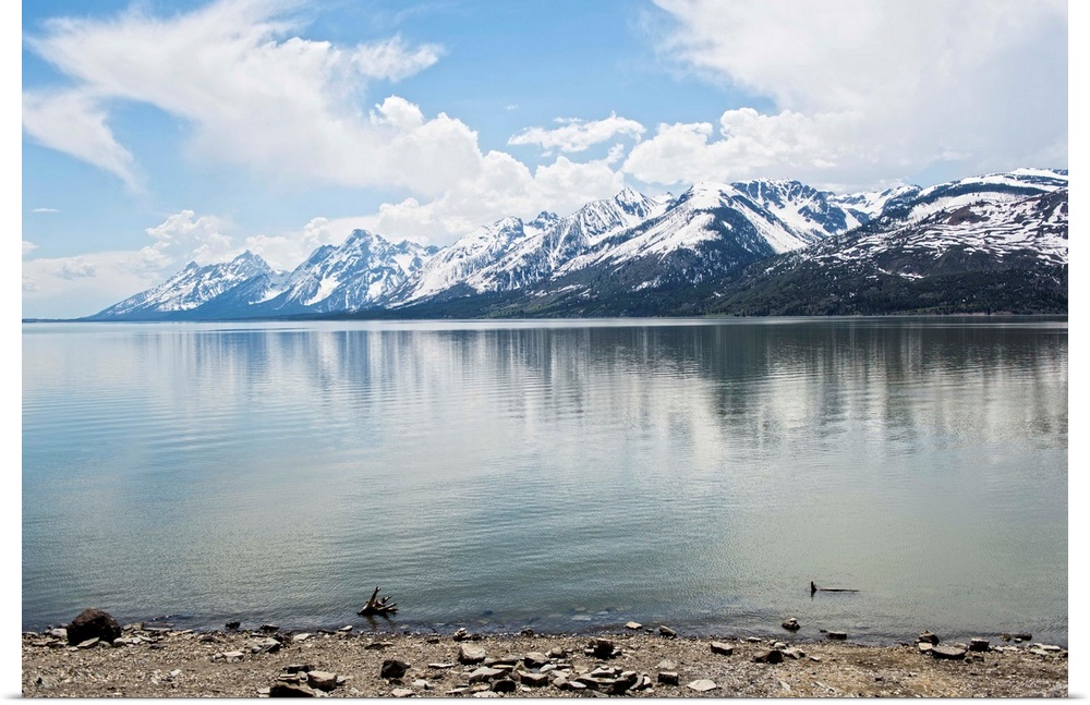 Landscape photograph of Jackson Lake with the Grand Teton mountains in the background.