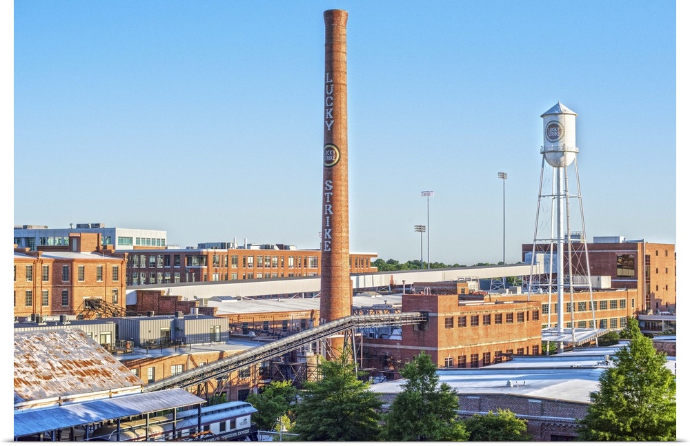 Lucky Strike Water Tower and Smokestack over the brick factory building, American Tobacco Historic District, Durham, North...