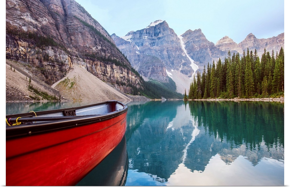 A red canoe on Moraine Lake in Banff National Park, Alberta, Canada.