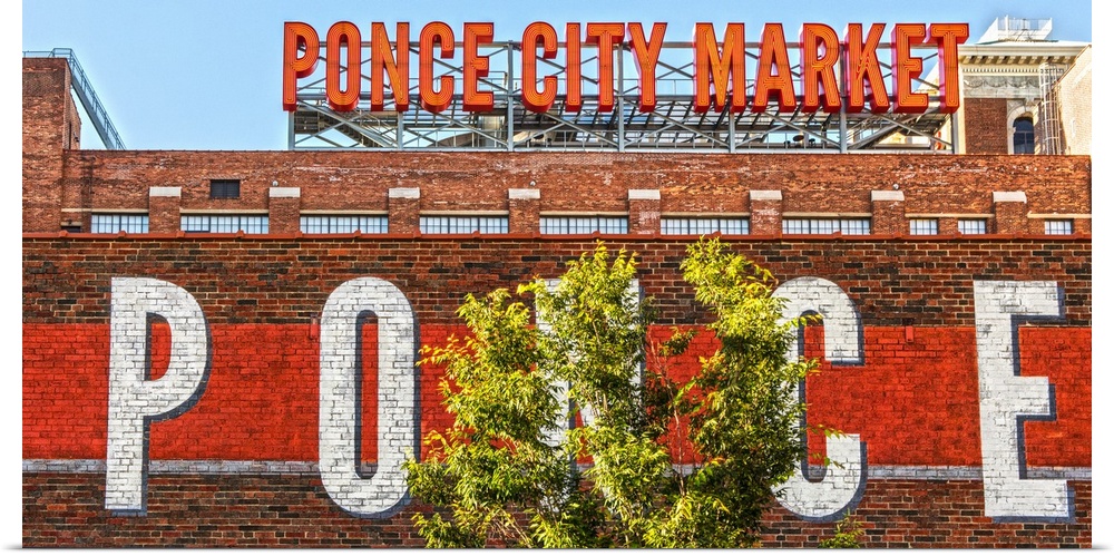 Tall neon letters on the rooftop terrace of Ponce City Market, a historic Sears, Roebuck and Co. building in downtown Atla...