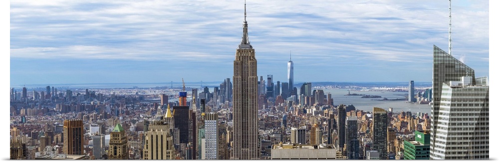 Panoramic view of New York City with the Empire State Building in the center.