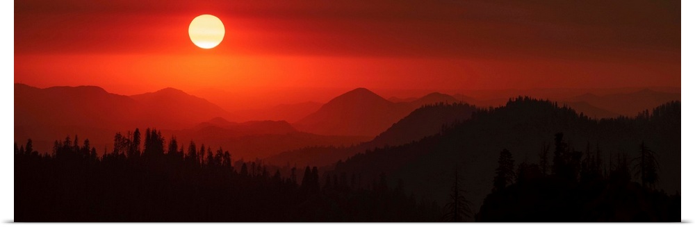 Panoramic view of a darkened red sky in Sequoia National Park, California.
