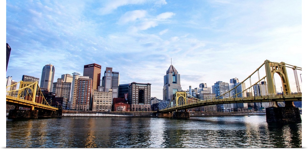 Photo of downtown Pittsburgh with Roberto Clemente Bridge over the Allegheny River.