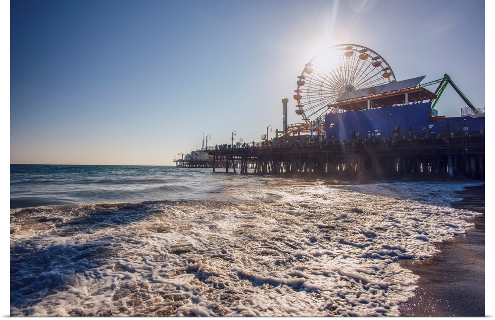 The Santa Monica Pier is a large double-jointed pier at the foot of Colorado Avenue in Santa Monica, California that is ov...
