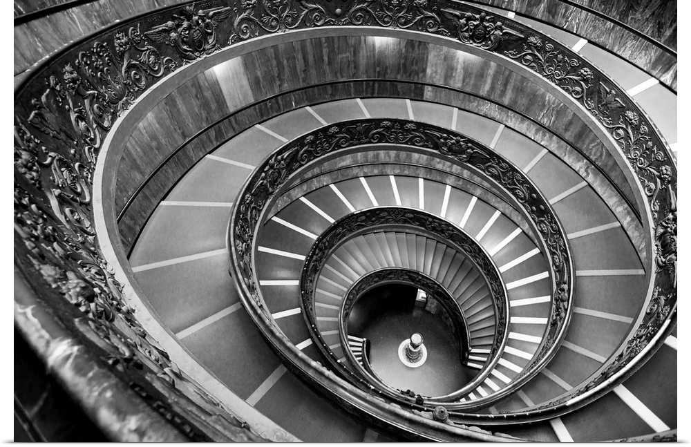 Black and white photograph of the spiral staircase at the Vatican Historical Museum.