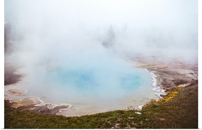 Steam rolling off of a hot spring at Yellowstone National Park
