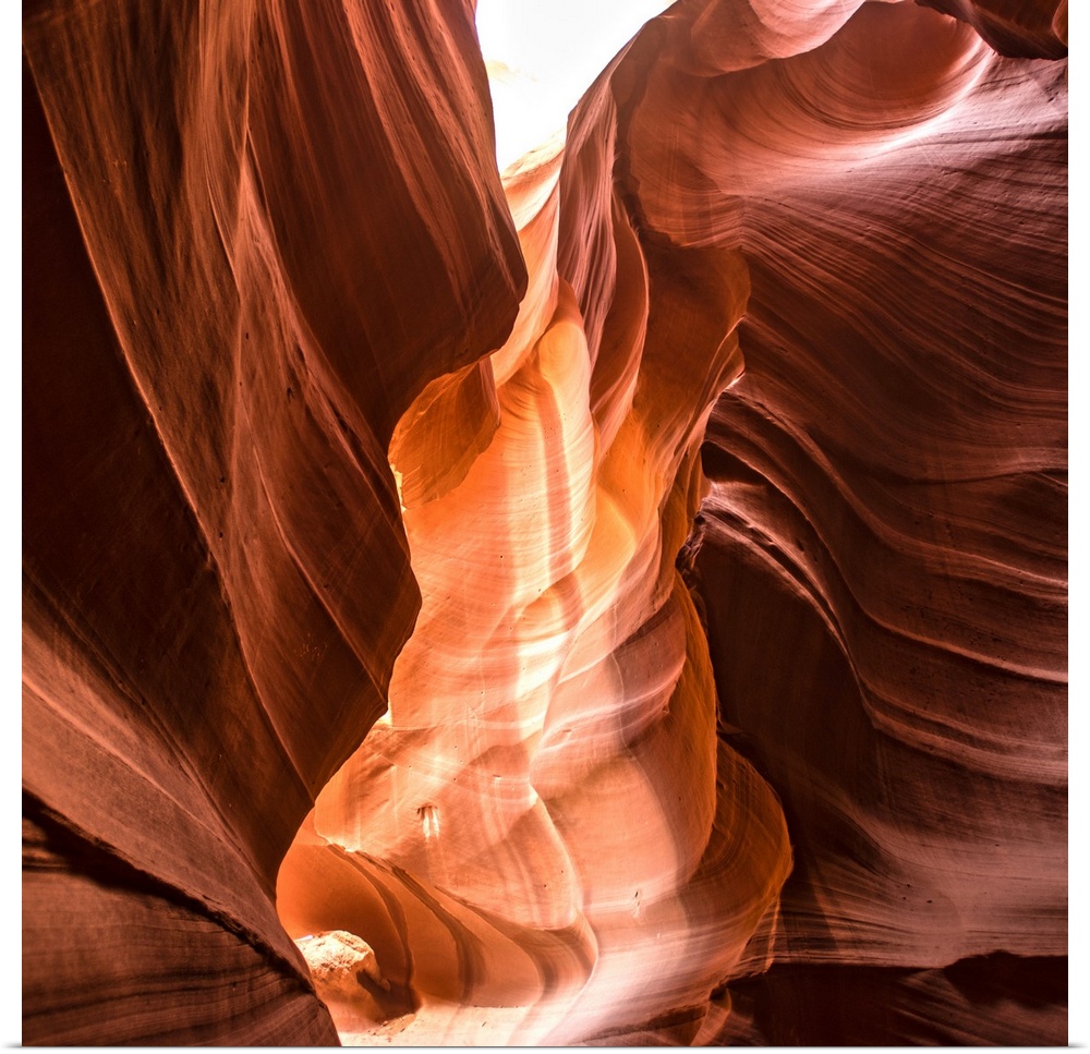 Square photograph inside of Antelope Canyon rock formation located on the Navajo Reservation in Page, Arizona with flowing...