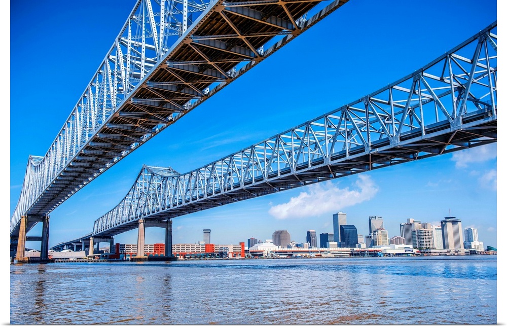 Photograph of the Crescent City Connection, formerly the Greater New Orleans Bridge, twin cantilever bridges that carry U....