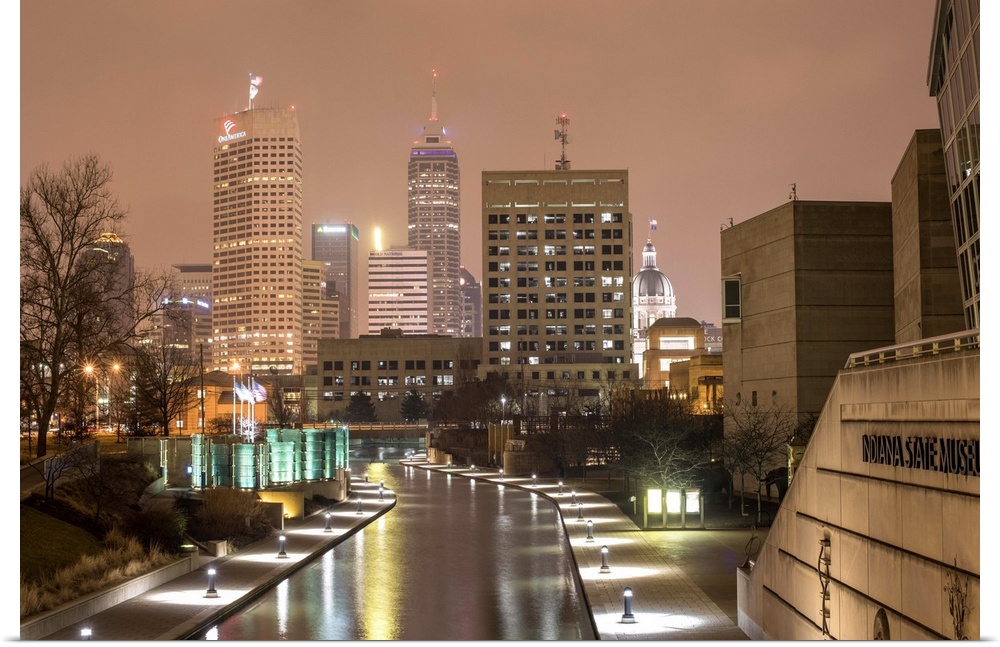 Waterway through the city of Indianapolis, Indiana, illuminated at night.