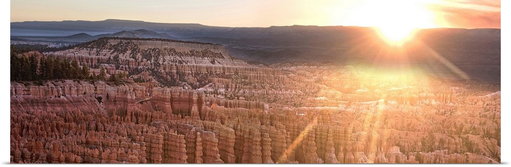Panoramic view of bright sunlight at twilight  Bryce Canyon Amphitheater in Bryce Canyon National Park, Utah.