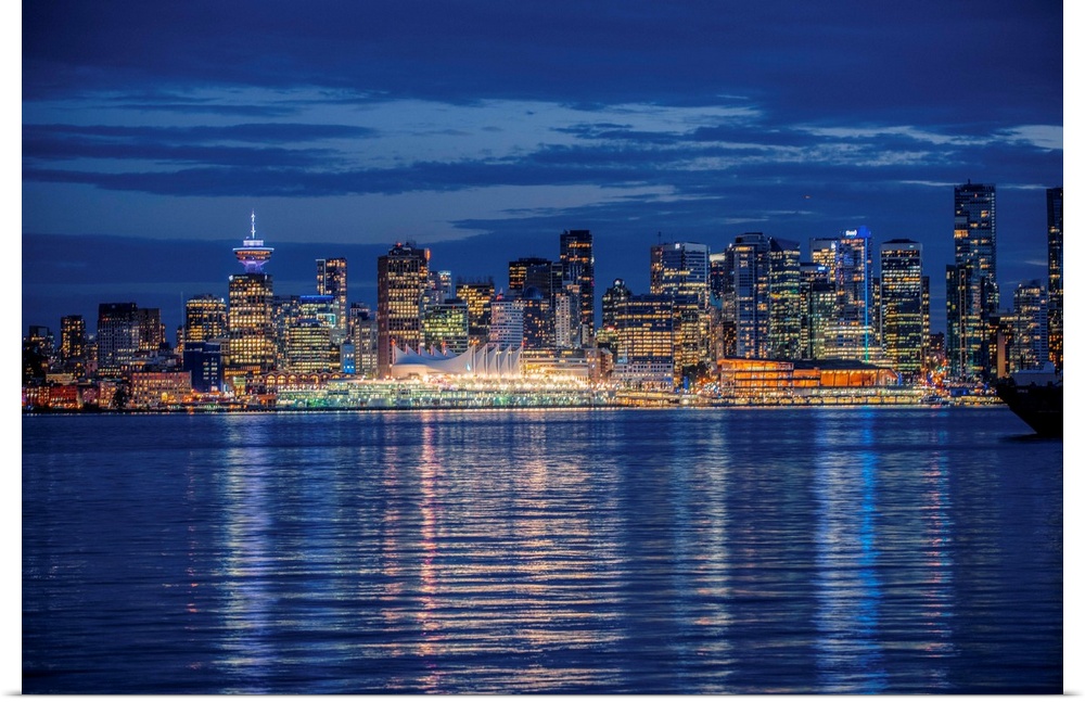 View of Vancouver skyline at night in British Columbia, Canada.