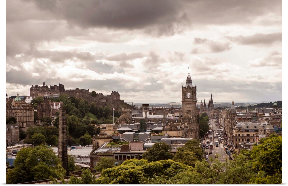 View of the city of Edinburgh with cloudy skies above.