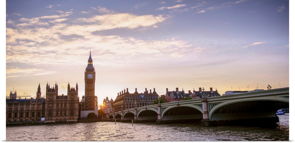 Panoramic photograph of the Westminster Bridge over the River Thames with Big Ben in the background at sunset, Westminster...