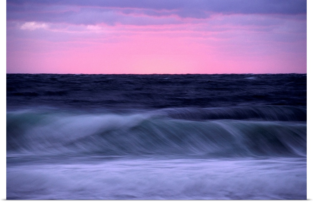 Sunset and storm surf on the Gulf of St.Lawrence. This picture was taken from C ape Breton Highlands National Park.