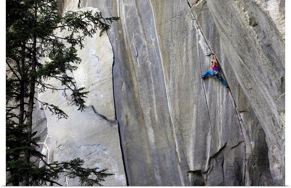 A climber ascending a difficult crack climb, Cadarese Valley, northern Italy, Europe