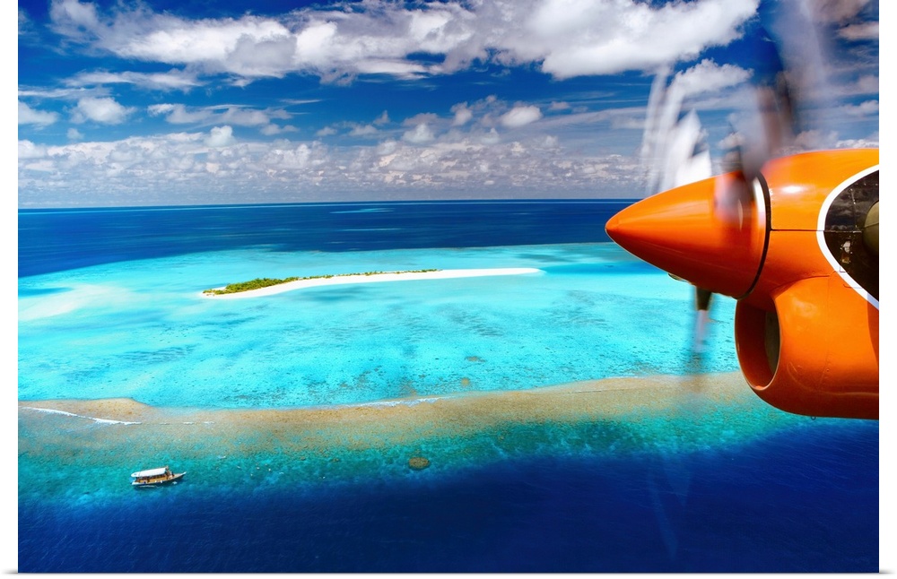Aerial view of island and seaplane, Male Atoll, The Maldives, Indian Ocean, Asia