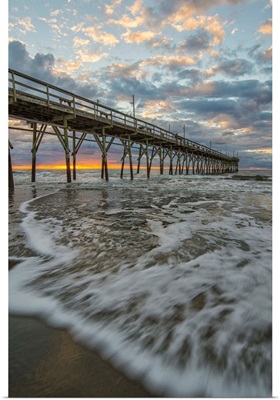 Beach, ocean, waves and pier at sunrise, Sunset Beach, North Carolina