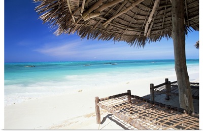 Beach parasol overlooking Indian Ocean, island of Zanzibar, Tanzania, Africa