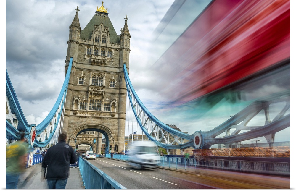 Blurred traffic under Tower Bridge, London.