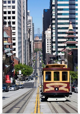 Cable car crossing Street in San Francisco, California