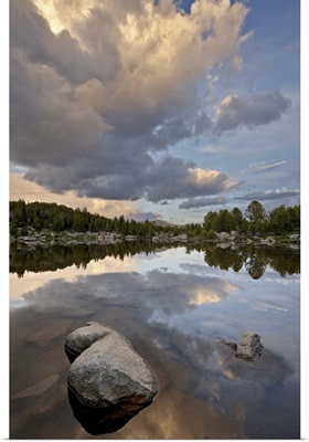 Cloud at sunset reflected in an unnamed lake, Shoshone National Forest, Wyoming